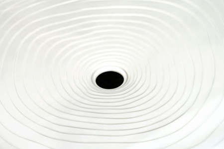 Unusual white bath sink in serpentine shapeの写真素材