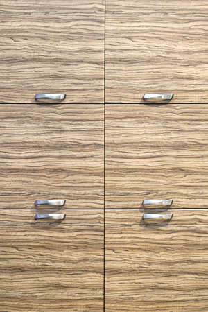 Six closet doors made from light woodの写真素材