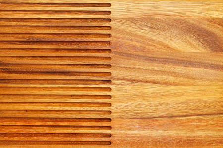 Background made from engraved brown wood boardの写真素材