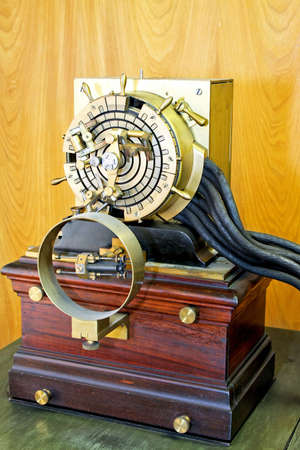 Old electric box with bunch of cablesの写真素材