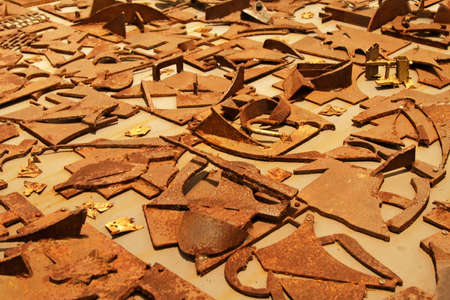 Bunch of rusty corroding scrap iron metalの写真素材