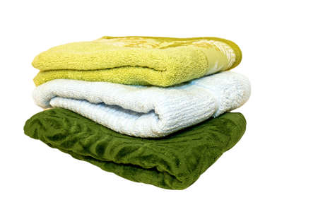 Three green soft and clean towels isolatedの写真素材