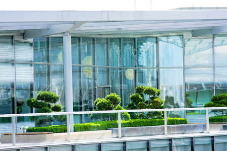 Rooftop penthouse apartment terrace with green gardenの写真素材