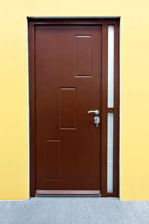 Close up shot of brown wood door entrance