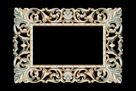 Old rectangular wooden frame isolated on blackの写真素材