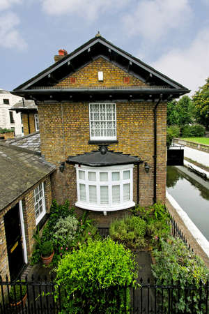 Small house with garden in English styleの写真素材