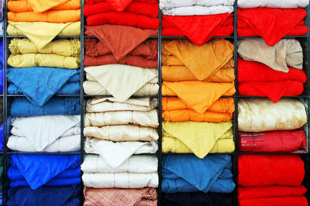 Bunch of colorful bedding sheets and blanketsの写真素材