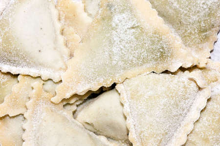 Close up shot of stuffed ravioli pastaの写真素材