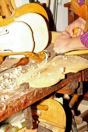 Close up shot of hands with chiselの写真素材