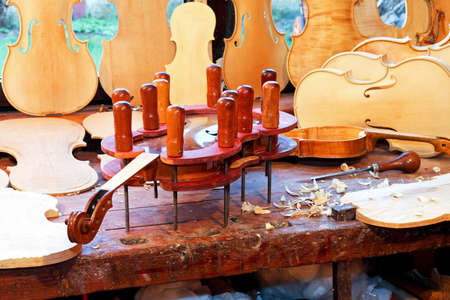 Close up shot of violin in press