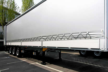 Close up shot of silver lorry trailer