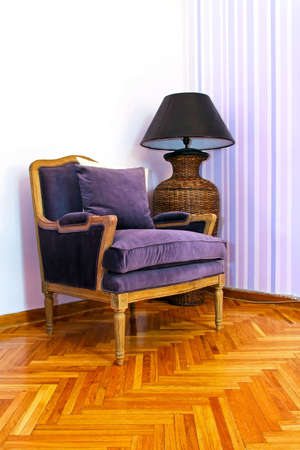 Reading room with vintage style purple armchairの写真素材