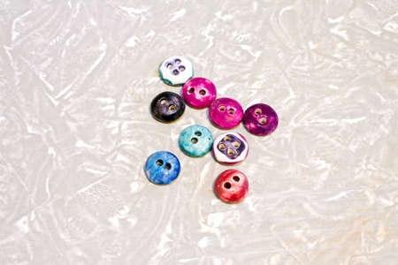 Close up shot of small decorative buttonsの写真素材