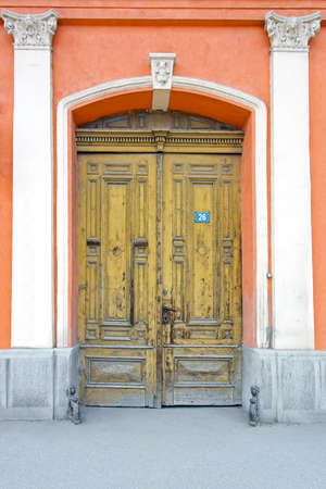 Close up shot of big old double doorの写真素材