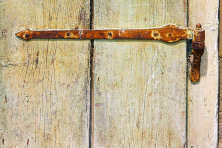 Close up shot of old rusty hingeの写真素材
