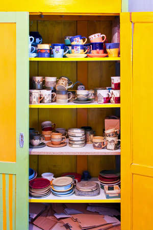 Hand made cups and mugs at shelfの写真素材
