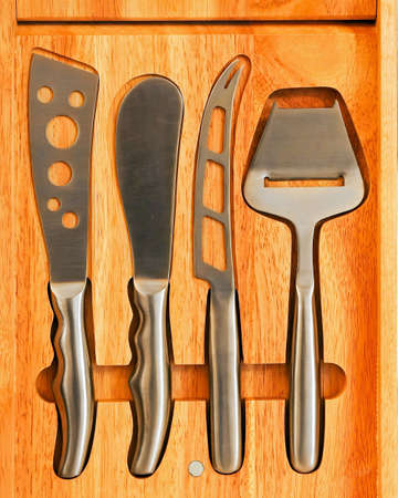 Four special cheese knives in wooden boxの写真素材