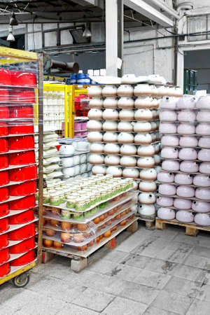 Big bunch of enamel kettles and potsの写真素材