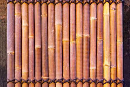 Close up shot of brown bamboo polesの写真素材