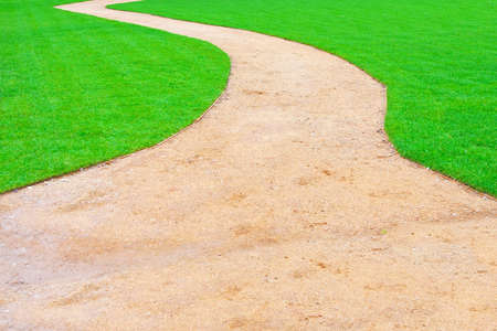 Green park path way in vanishing perspectiveの写真素材