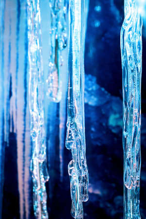 Close up shot of frosty blue icicleの写真素材