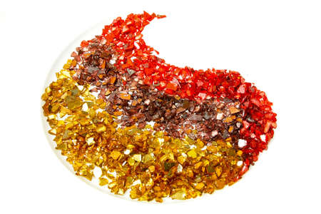 Decorative stones in three colors gold bronze and redの写真素材