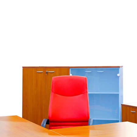 Corner of a modern office with red chairの写真素材