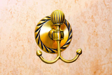 Close up shot of classic style brass hookの写真素材