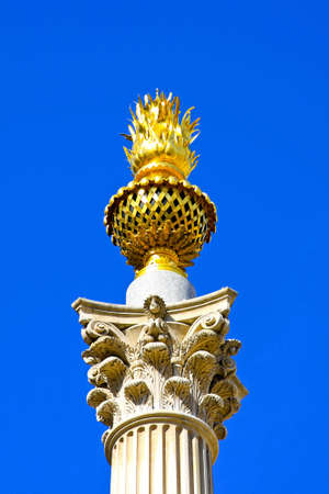 Sculpture on the top of a pillar resembling flameの写真素材