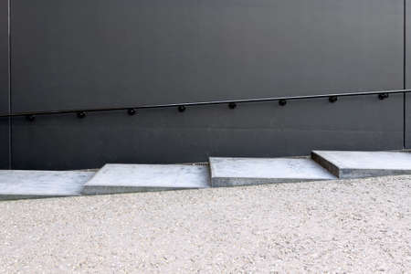 Gray concrete stairs with metal hand railの写真素材