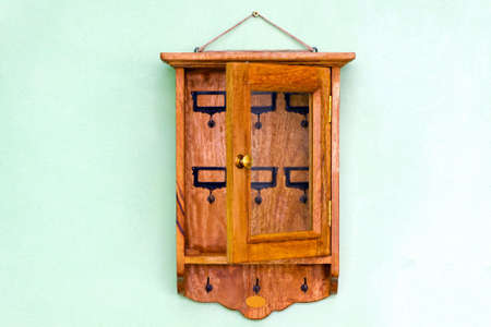 Old retro wooden box for hanging keysの写真素材