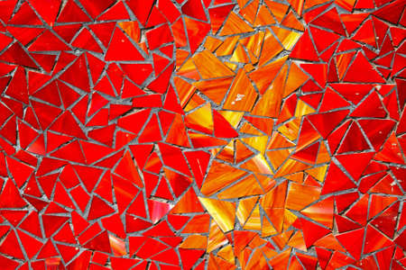 Red mosaic with collage of small piecesの写真素材