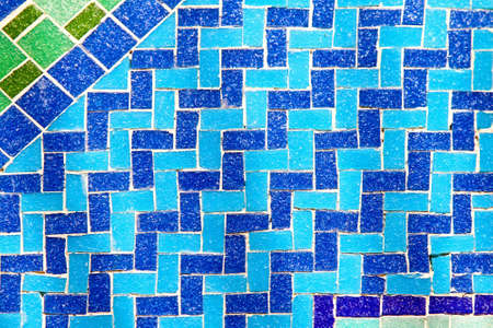 Old blue tiles mosaic in wave shape の写真素材