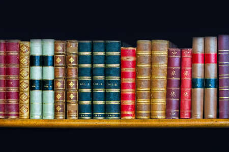 Bunch of colorful books at library rackの写真素材