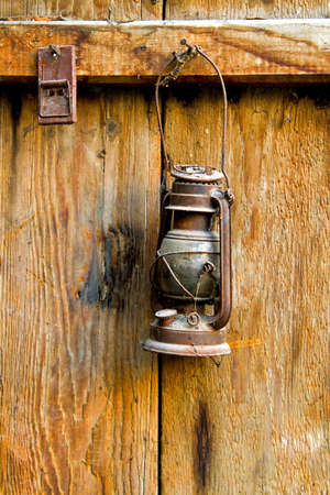 Very old and rusty brown oil lampの写真素材