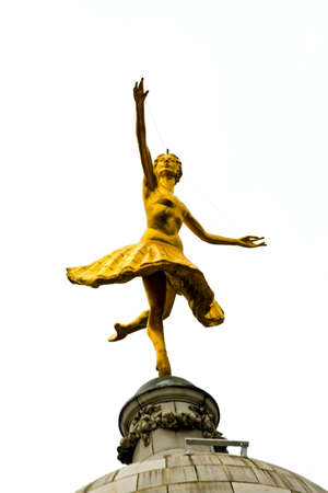 Gold ballet dancer sculpture at rooftop in Londonの写真素材
