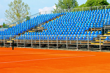 New modern tennis court with blue stands  の写真素材