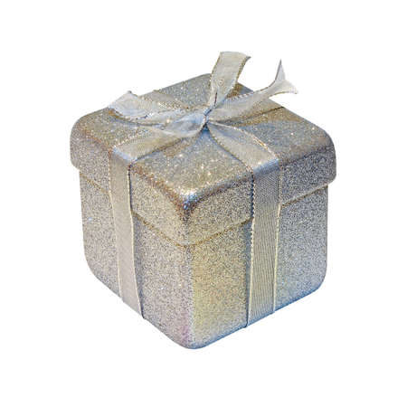 Christmas gift packed into golden box isolated の写真素材