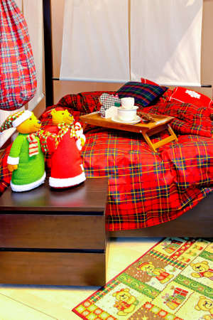 Corner of bedroom interior with Christmas decoration 
