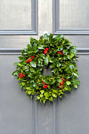 Wreath decoration at door for Christmas holiday の写真素材