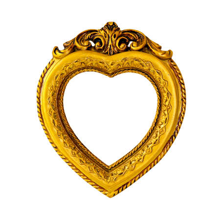 Gold frame in heart shape isolated の写真素材