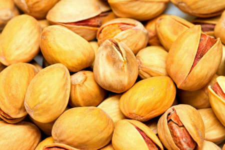 Natural organic raw pistachios with shell texture 