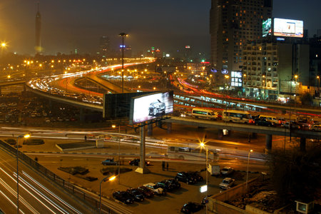 CAIRO, EGYPT - MARCH 02: Night intersection in Cairo on MARCH 02, 2010.  City centre at night with heavy traffic Cairo, Egypt. のeditorial素材