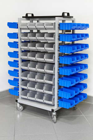 Trolley with plastic shelves for garage shop の写真素材