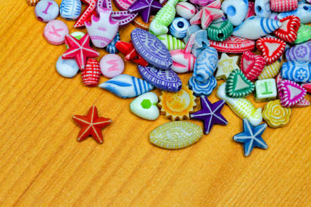 Colorful plastic art and craft beads assortment varietyの写真素材