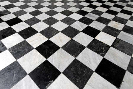 Black and white tiles in checkers pattern の写真素材
