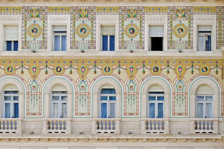 Facade with mosaic tile decoration in Trieste  の写真素材