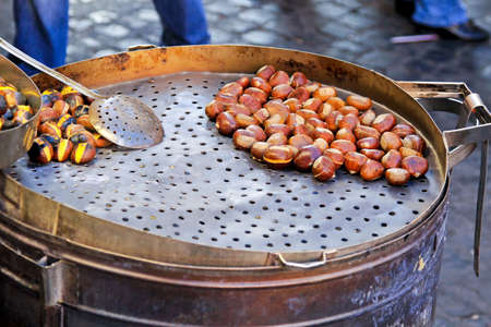 Bunch of roasted chestnuts at street wendorの写真素材