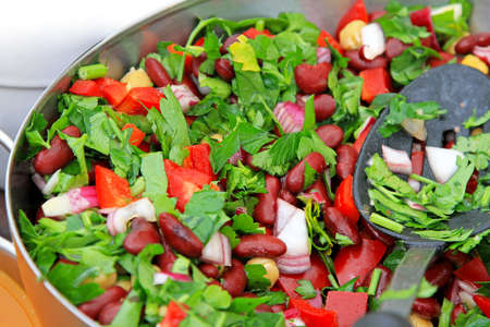 Detail of freshly prepared vegeterian salad with beansの写真素材