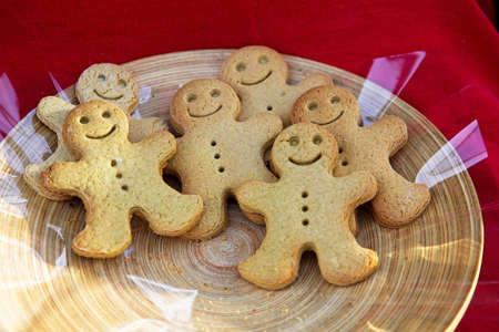 Freshly made gingerbread man in the basket